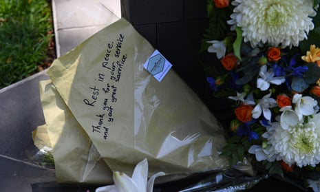 Floral tributes at a police memorial in Brisbane Botanic Gardens last week