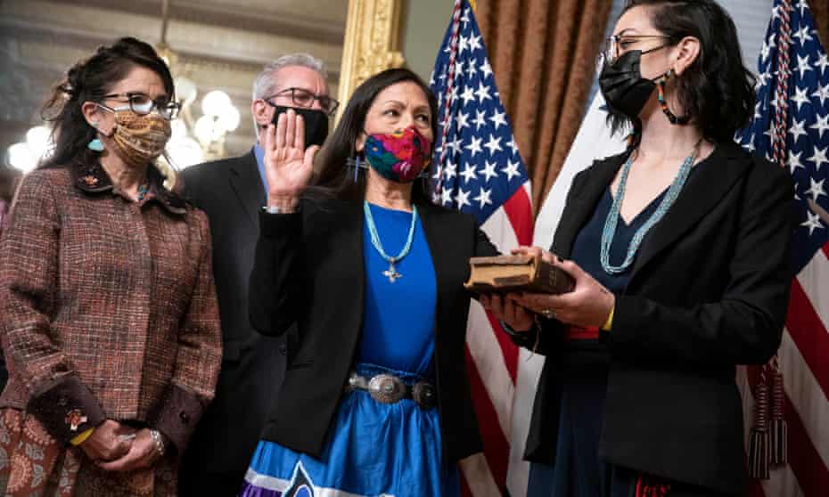 Deb Haaland, pictured here being sworn in last week, is charged with managing natural resources and federal lands that comprise one-fifth of the United States.
