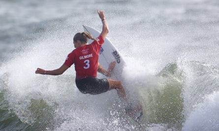 Gilmore attacks a wave during the Tokyo Olympics.