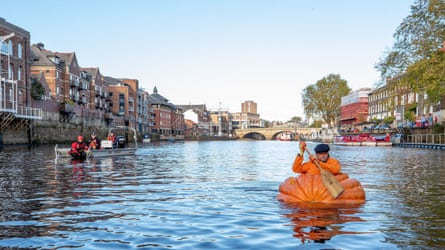 Tom Pearcy rowing his pumpkin boat in 2018.