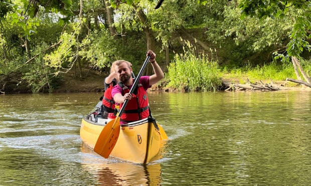 Storyteller Jake Evans joins Kevin in his canoe.