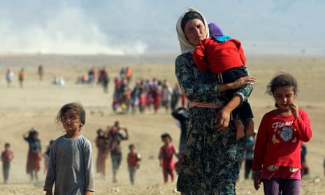 Yazidis fleeing their towns for Mount Sinjar as Islamic State forces advanced on them fours years ago. 