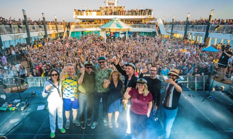 Fun ahoy! … Belle and Sebastian (Stuart Murdoch fourth from right) and fans on the indie festival cruise aboard the Norwegian Pearl.