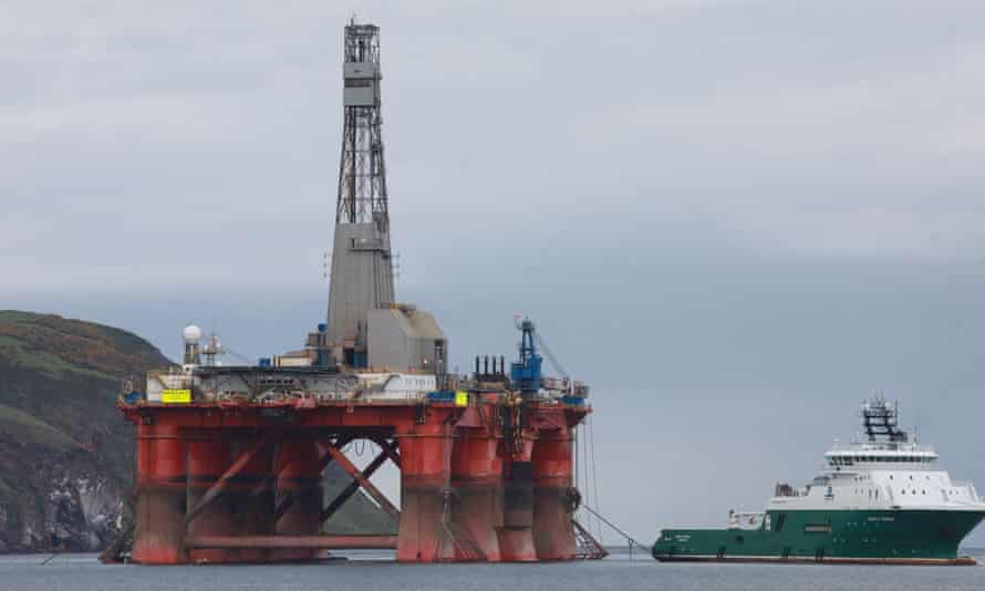 The oil rig in Cromarty Firth, Scotland, as it was being towed out to sea.