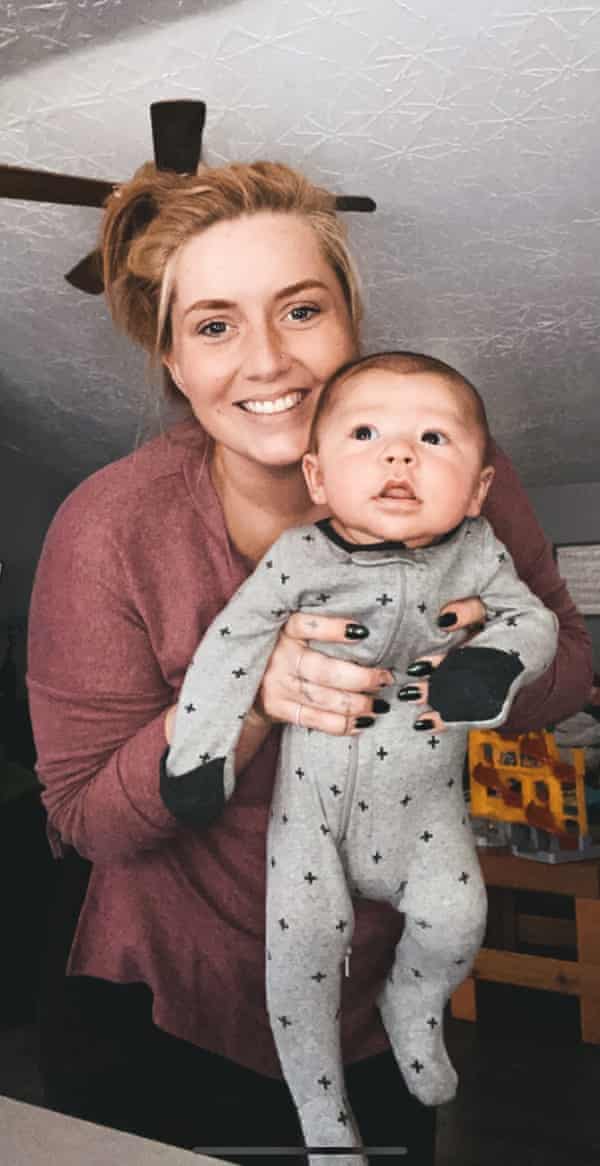 Sierra Martin with baby Steven, to whom she gave birth to – but will give back to his two fathers once travel restrictions are eased.