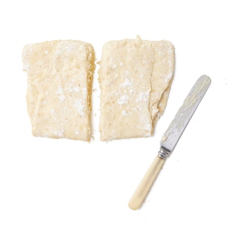 Turn the pastry 90 degrees, repeat the folds, then cut the pastry in half. On a well-floured work surface, roll out one half of the pastry