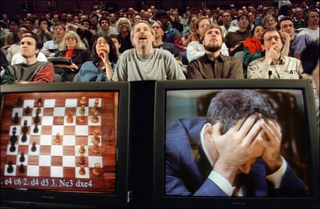 Man versus machine: chess enthusiasts watch Garry Kasparov in his final match against Deep Blue, New York, 11 May 1997.