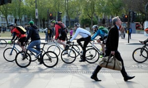 Commuters walking and cycling to work.