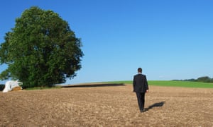 Business Man walking into horizon