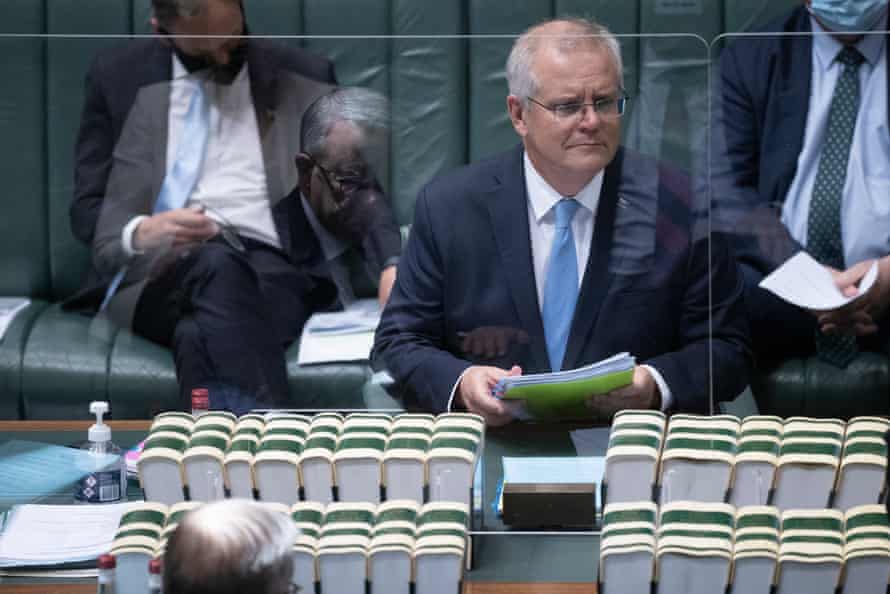 Scott Morrison and Anthony Albanese in reflection during question time