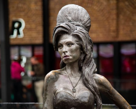 A bronze sculpture of the singer Amy Winehouse