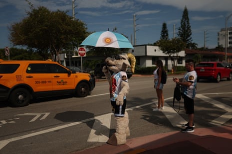 An Argentine fan wearing a goat costume walks on a street in Miami on the eve of Argentina v Cape Verde.