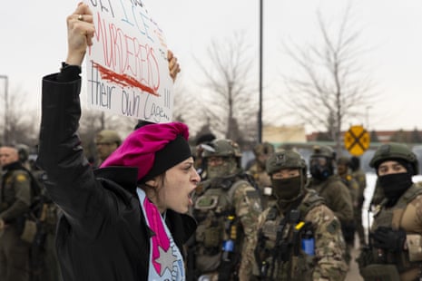 A woman chants outside an Immigration and Customs Enforcement (ICE) facility during a protest against ICE following the fatal shooting of Renee Good, a 37-year-old woman by a U.S. immigration agent, in Minneapolis, United States, on January 8, 2026. (Photo by Mostafa Bassim/Anadolu via Getty Images)