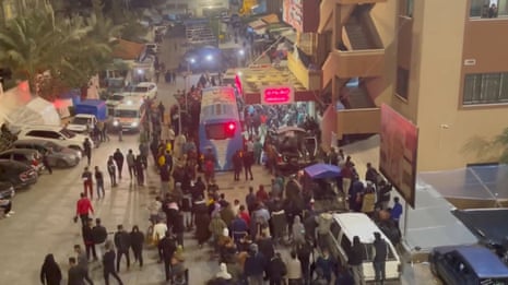 A screenshot from a handout video from the Palestinian ministry of health which claims to show injured and displaced Palestinians arriving in a bus at Nasser hospital.
