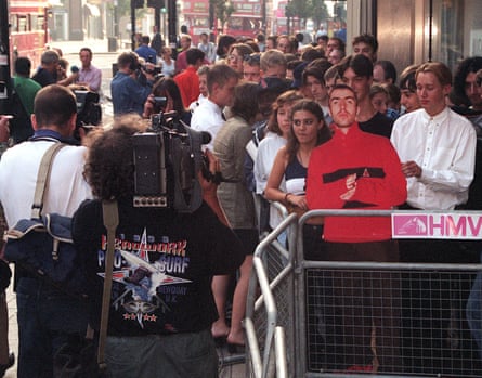 Oasis fans queue outside HMV Oxford Street on 21 August 1997 to buy Be Here Now. Hundreds of stores across the country opened at 8am to give fans the chance to buy the record at the earliest opportunity.