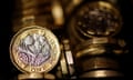 Pound coins are seen in this photo illustration taken in Manchester, Britain September 6, 2017. REUTERS/Phil Noble/Illustration