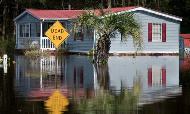 Disaster relief payments to people harmed by hurricanes Florence, above, and Michael have been delayed by the shutdown.