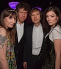Singer Lorde (on right) with Lena Dunham (on left) and Beck (second right) at a Grammys party, 2017
