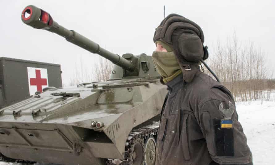 A Ukrainian soldier trains during military drills close to Kharkiv, Ukraine.