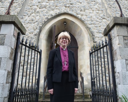 The archbishop of Canterbury, Sarah Mulally, outside a church
