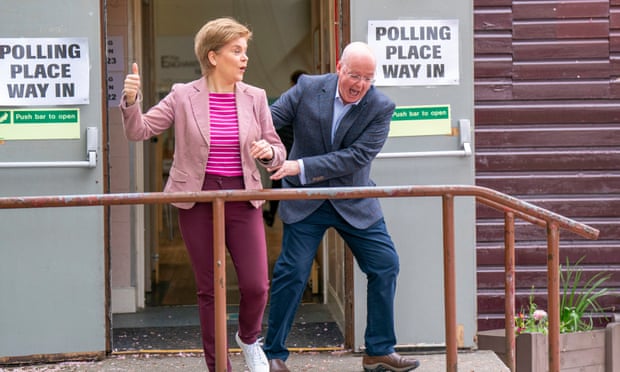 Sturgeon with her husband Peter Murrell as voting began in the local government elections in May this year
