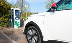 An electric Kia E Soul car being charged