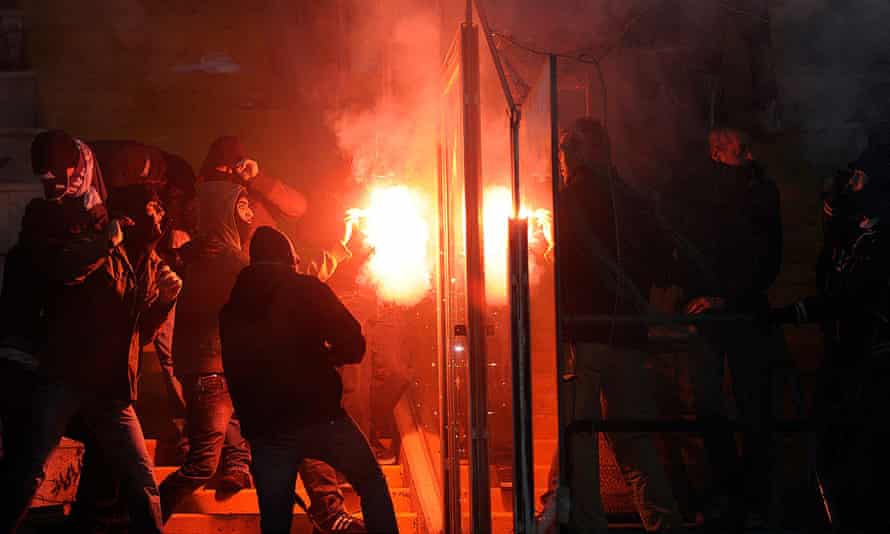 Napoli and Juventus ultras clash at Naples’ ground, during a Serie A match on January 9, 2011.