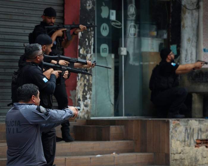 Brazilian police raid Rio favelas in deadliest operation against gangs – video