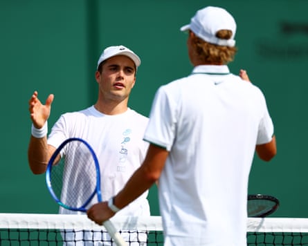Arthur Fery practises on court with Cruz Hewitt before his main draw semi-final