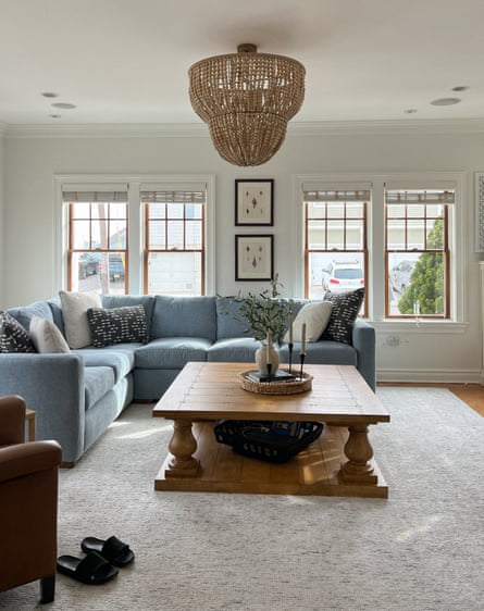 couch and coffee table on rug in living room area