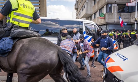 NETHERLANDS-POLITICS-AGRICULTURE-DEMOPolicemen disperse and arrest protesters during a farmers’ protest against the cabinet’s proposed nitrogen policy in the Hague, on June 28, 2022. - Netherlands OUT (Photo by Lex van LIESHOUT / ANP / AFP) / Netherlands OUT (Photo by LEX VAN LIESHOUT/ANP/AFP via Getty Images)