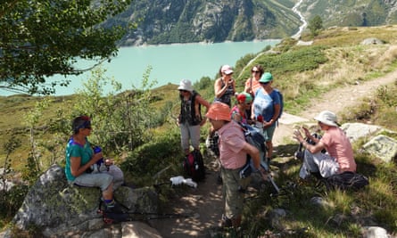Members of the KlimaSeniorinnen stop to rest during a walk.