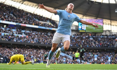 Erling Haaland celebrates after scoring the third for Manchester City.