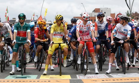 Victor Lafay (green jersey), Adam Yates (yellow), Neilson Powless (polka-dot) and Tadej Pogacar (white) line up at the front of the bunch before yesterday’s stage.