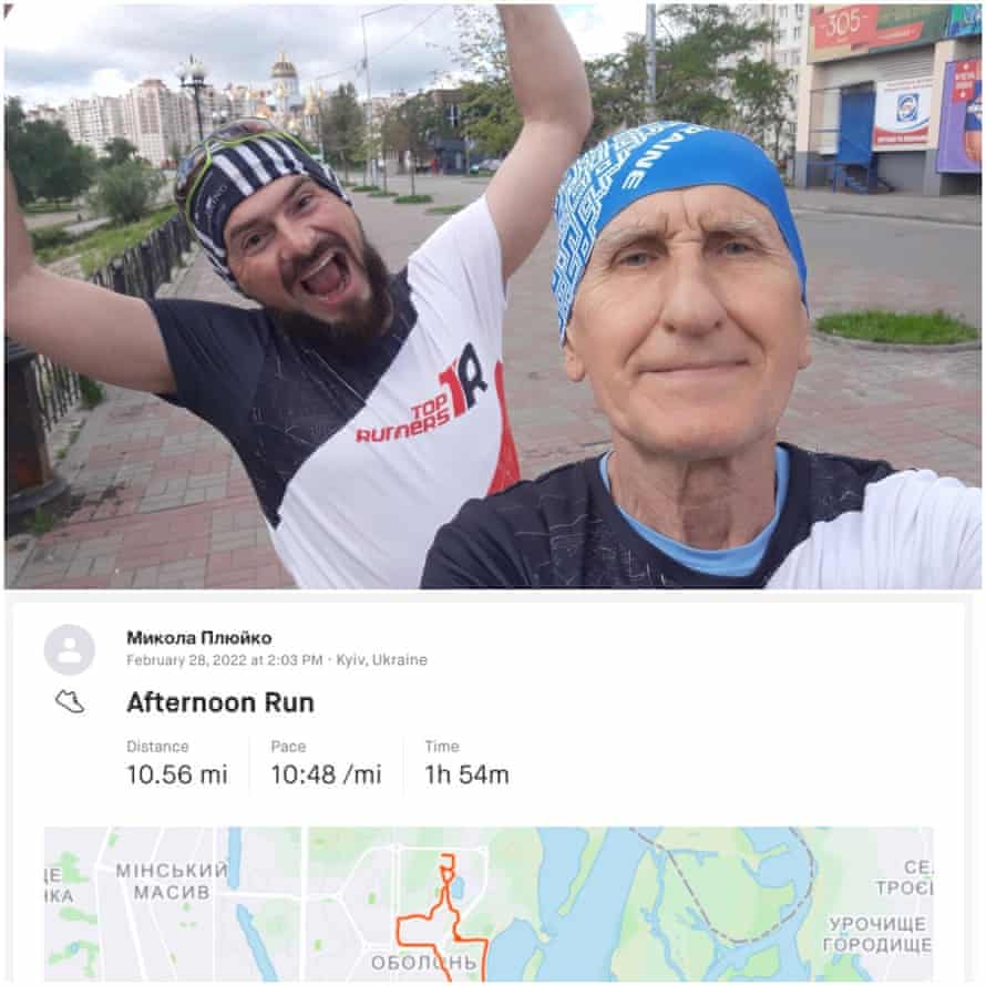 Two men wearing bandanas posing for a selfie