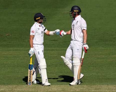 England’s Joe Root and Zak Crawley on day one