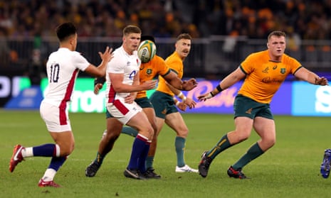 England’s Owen Farrell passes to Marcus Smith (left) during the defeat by Australia in Perth