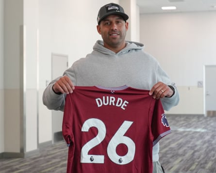 Seattle Seahawks Head Defensive Coordinator and West Ham Fan Aden Durde from London UK with West Ham Shirt.