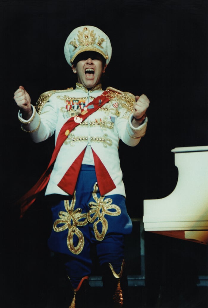 7 of Elton John's most iconic outfits