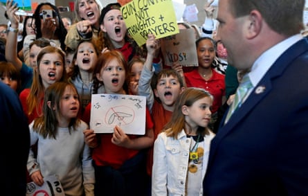 Students shout at state lawmakers as they demonstrate against gun violence in Nashville during a March for Our Lives walkout on 3 April.