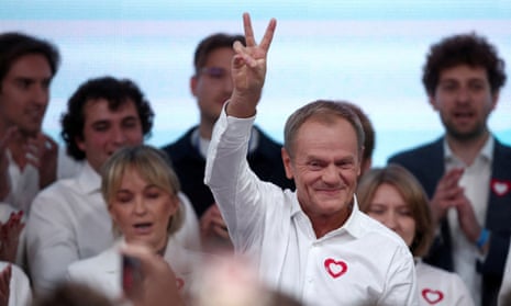 Donald Tusk, leader of the largest opposition grouping Civic Coalition (KO), gestures after the exit poll results are announced in Warsaw, Poland, in October 2023. 