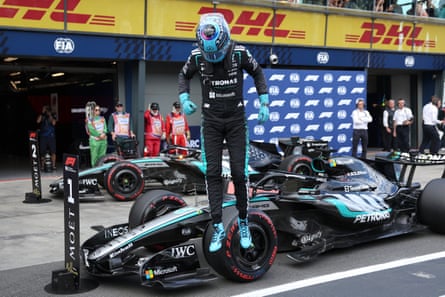 Mercedes driver George Russell celebrates after claiming pole during the qualifying session for the Formula One Australian Grand Prix at Albert Park