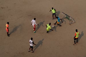 Footballers from west Africa practise at a ground in Naya Bazar in central Kathmandu
