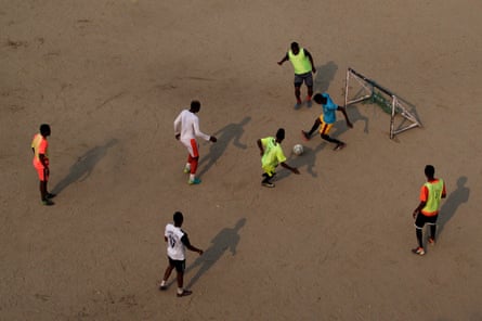 Footballers from west Africa practise at a ground in Naya Bazar in central Kathmandu