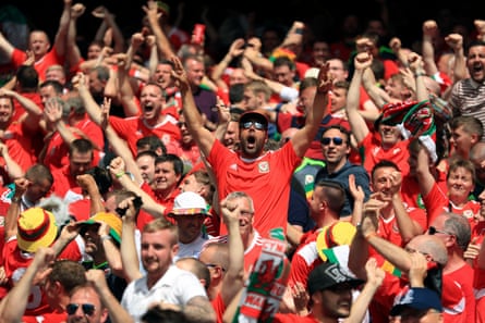 Wales fans celebrate their first goal against Slovakia at Euro 2016, scored by Gareth Bale