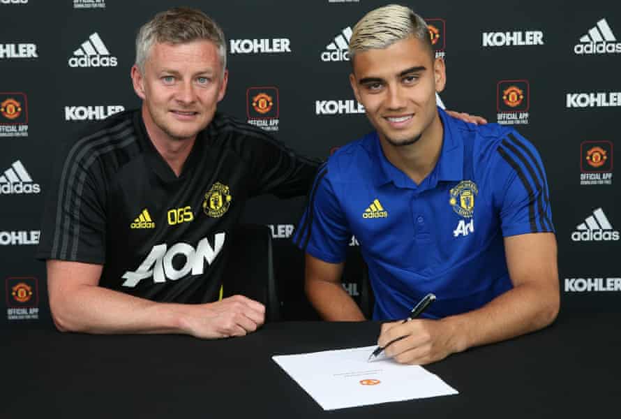 Andreas Pereira of Manchester United poses with Ole Gunnar Solskjær after signing a new contract with the club.