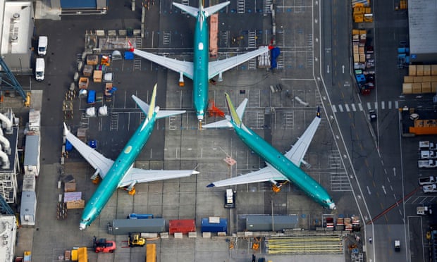 An aerial photo shows Boeing 737 Max airplanes parked on the tarmac at the Boeing factory in Renton, Washington, on 21 March 2019.