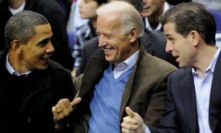 Barack Obama, Biden and his son Hunter attend a basketball game in Washington in 2010.