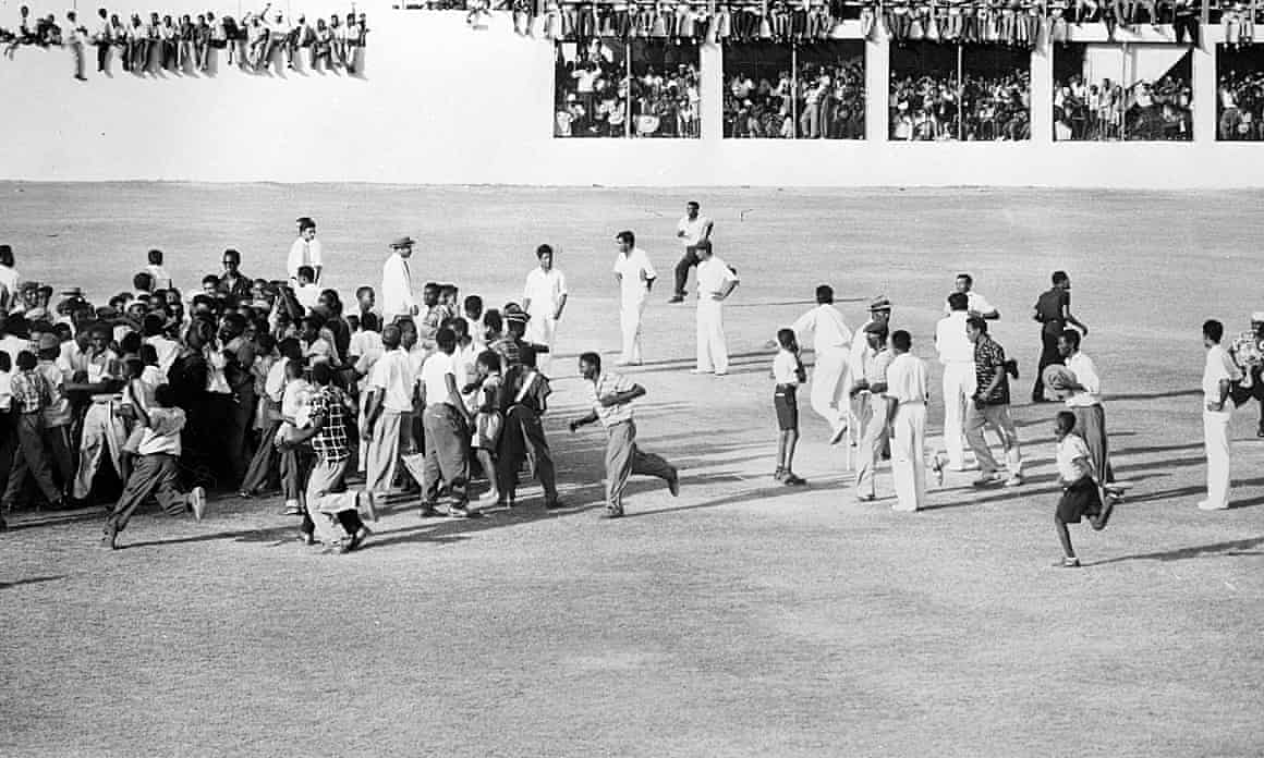 Fans mob Garfield Sobers after he set a Test record of 365 for West Indies against Pakistan in Jamaica in 1958