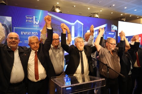 The head of the Joint List alliance Yousef Jabareen (fourth from left) celebrates with other party leaders the record turnout by Palestinian Israeli voters, at their headquarters in Nazareth on 27 October 2026.